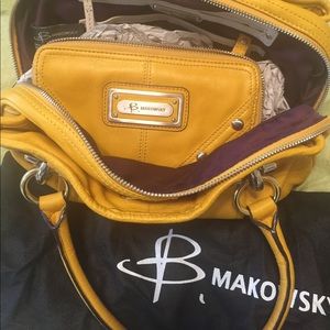 B. Makowsky mustard leather purse and wallet